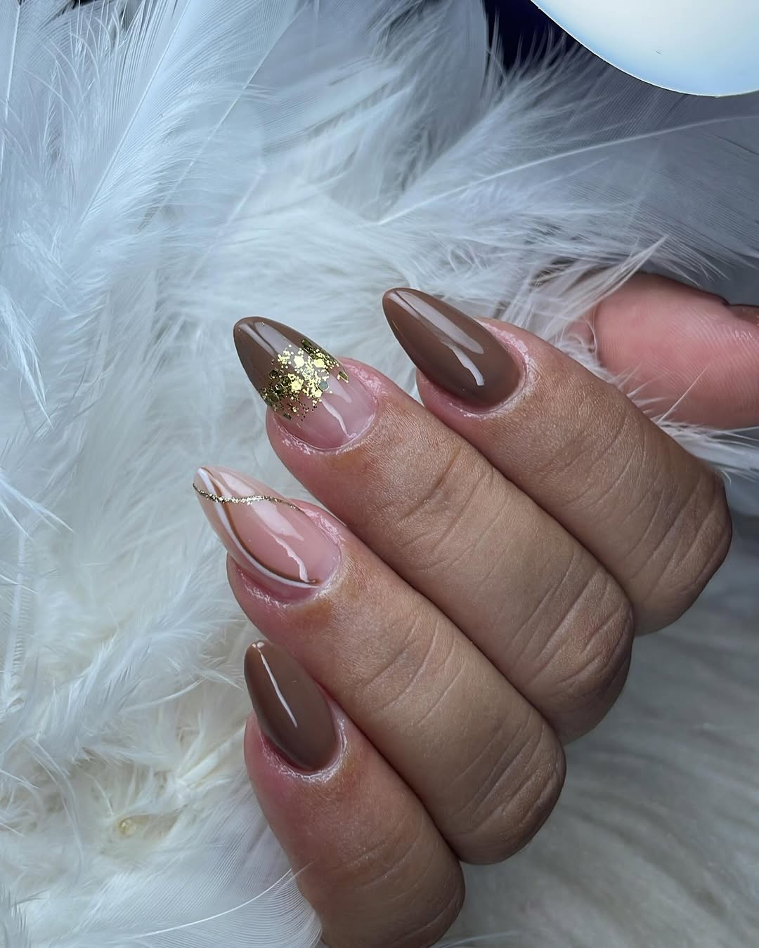 French-2025-nails-design with-burgundy-and-glitter-accents