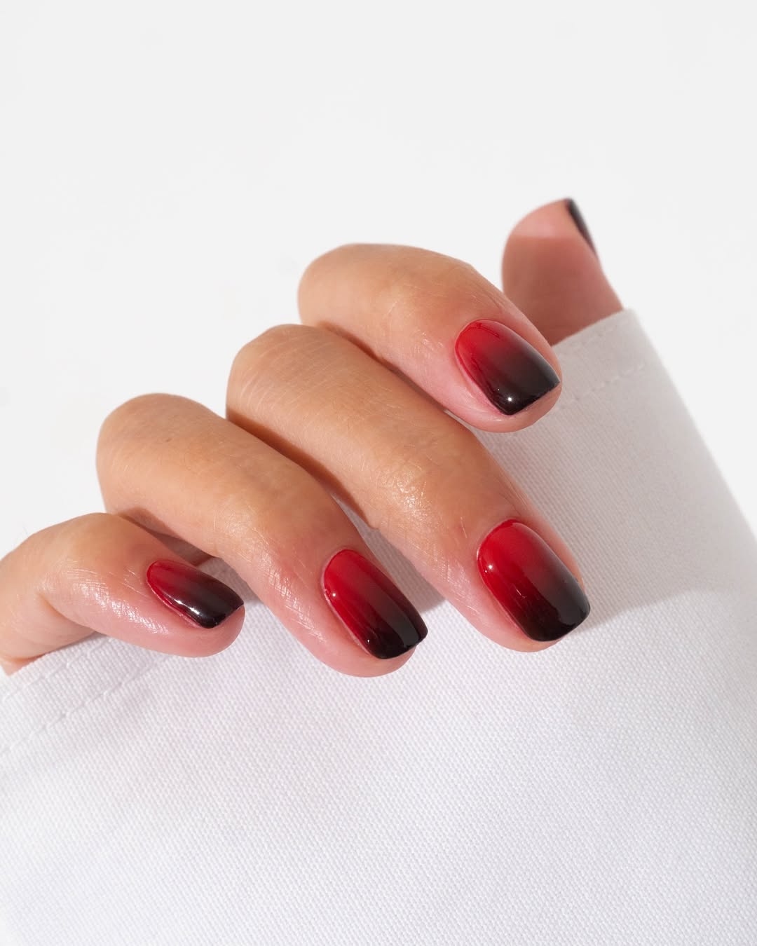 Hand-with-burgundy-ombre-nails-desing-ideas