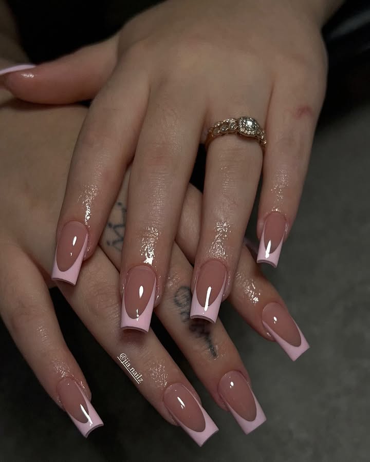 Hands-with-Nude-pink-nails-with-pastel-pink-French-tips-and-crisp-square-edges.jpg