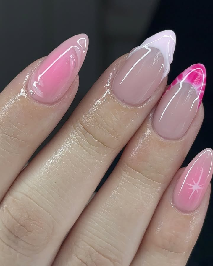 Hands-with-blush-wave-nails-featuring-soft-pink-hues-swirls-and-gradients.jpg