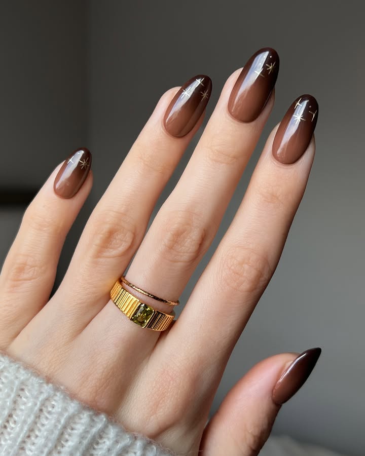 Mocha-Starlight-Nails-with-creamy-brown-polish-and-gold-star-accents-jpg