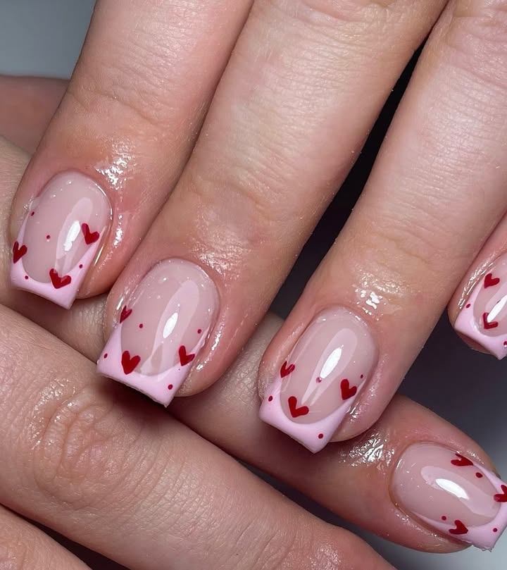pink-french- tip-nails-with-glossy-finish-delicate-red-hearts-and-tiny-dots.jpg