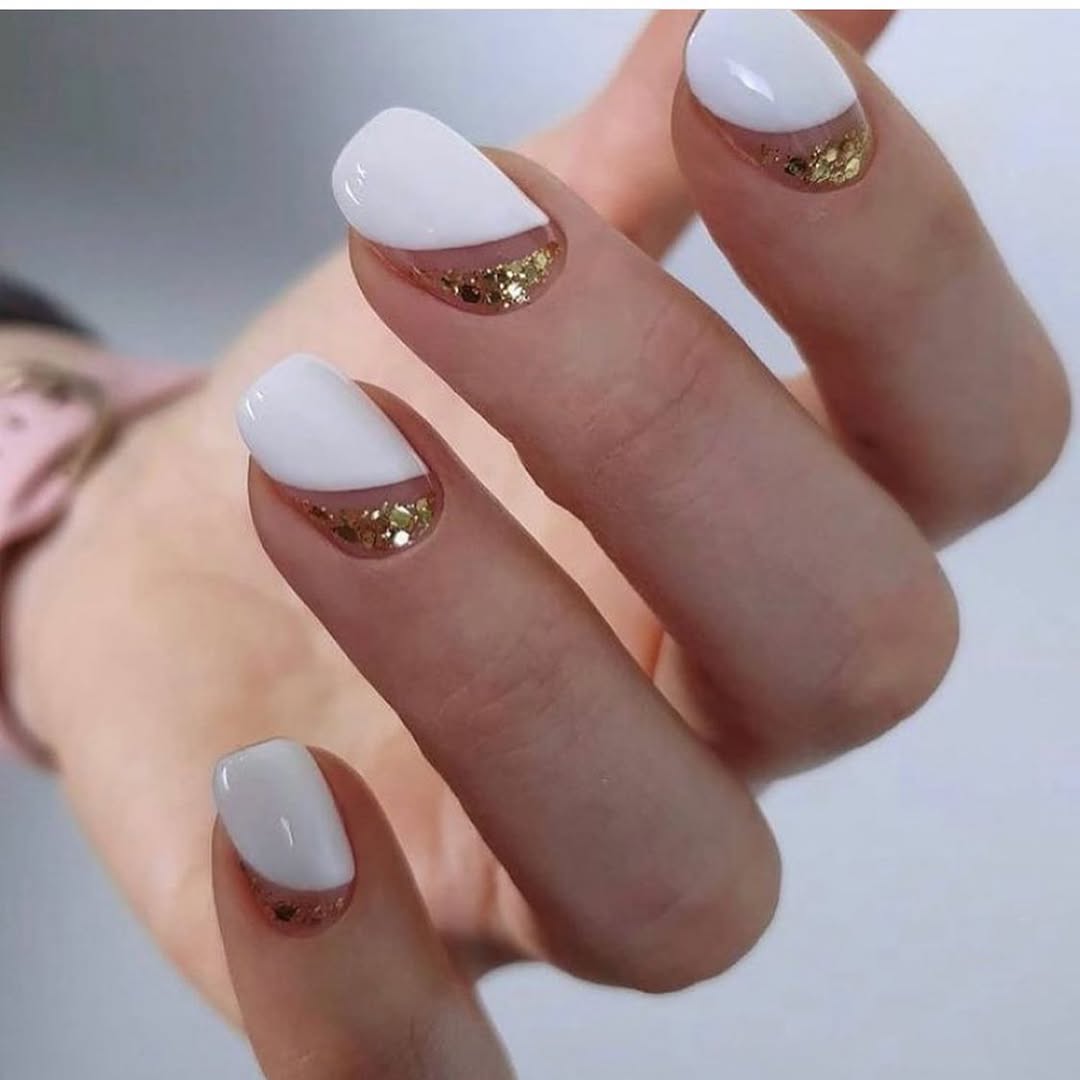 classic-white-nail-desing-with-gold-crescent-design.