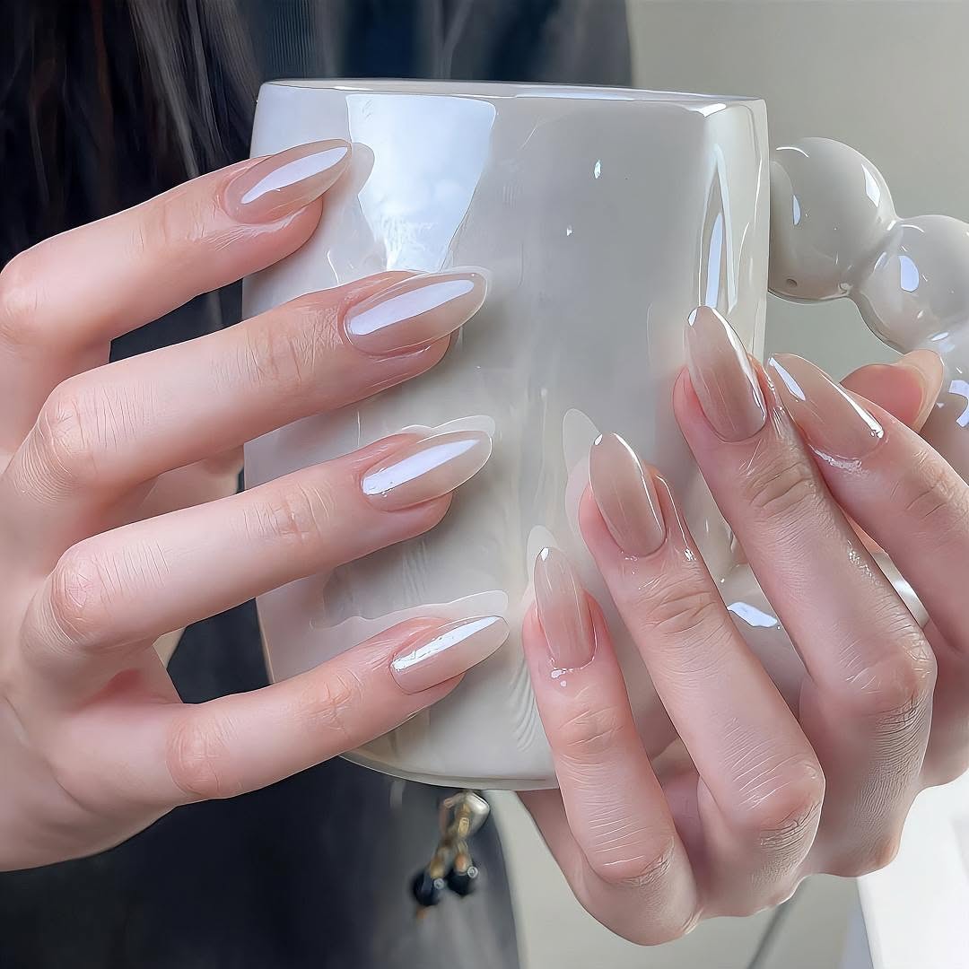Glossy-milky-white-almond-shaped-nails-with-a-creamy-elegant-finish.jpg