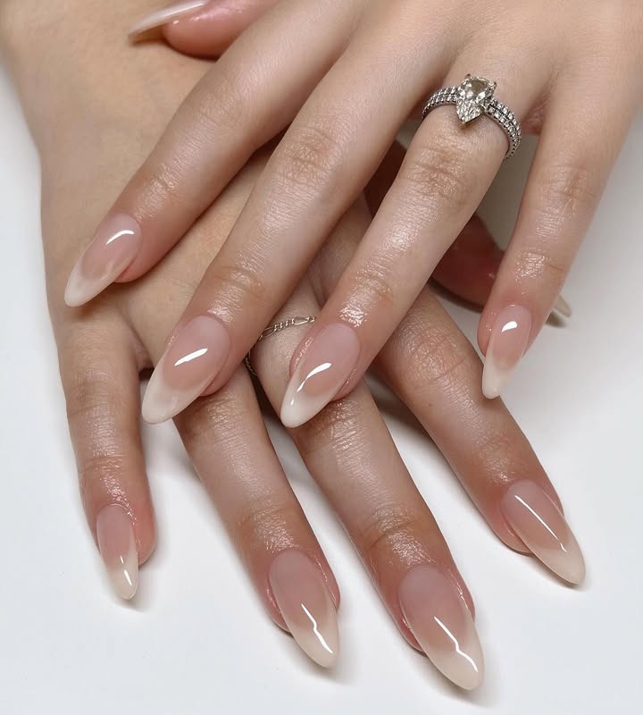 Glossy-milky-white-nails-with-a-silky-luminous-finish.jpg