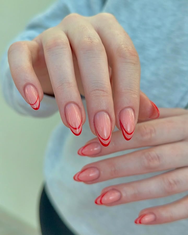 Glossy-nails-with-sharp-red-outlines-perfect-for-a-modern-summer-look-1.jpg