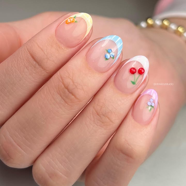 Nude-nails-with-pastel-French-tips-and-3D-fruits-and-flowers-for-spring-nail-designs.jpg