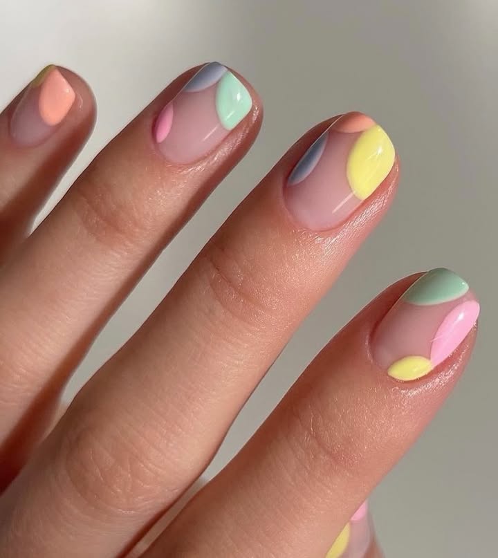 Nude-nails-with-pastel-droplets-perfect-for-subtle-spring-nail-designs.jpg