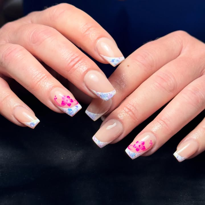 Petal-Pop-Confetti-May-nails-with-icy-shimmer-tips-and-hot-pink-floral-accents.jpg