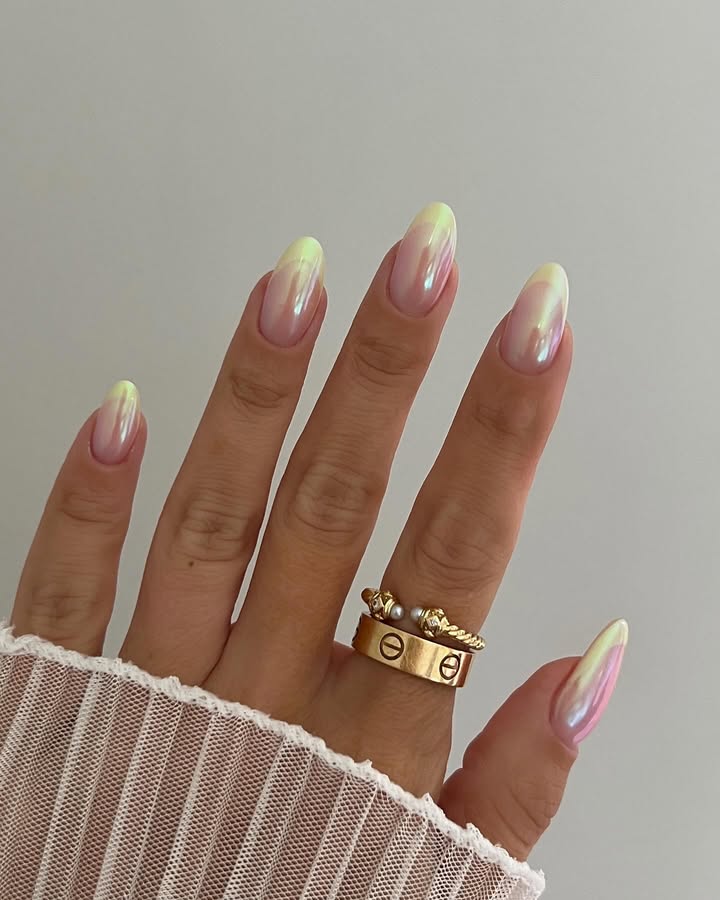 Soft-lilac-and-buttery-lemon-swirl-together-in-ethereal-aurora-nails-with-a-luminous-pearl-glaze-paired-with-Rings-and-white-outfit.jpg