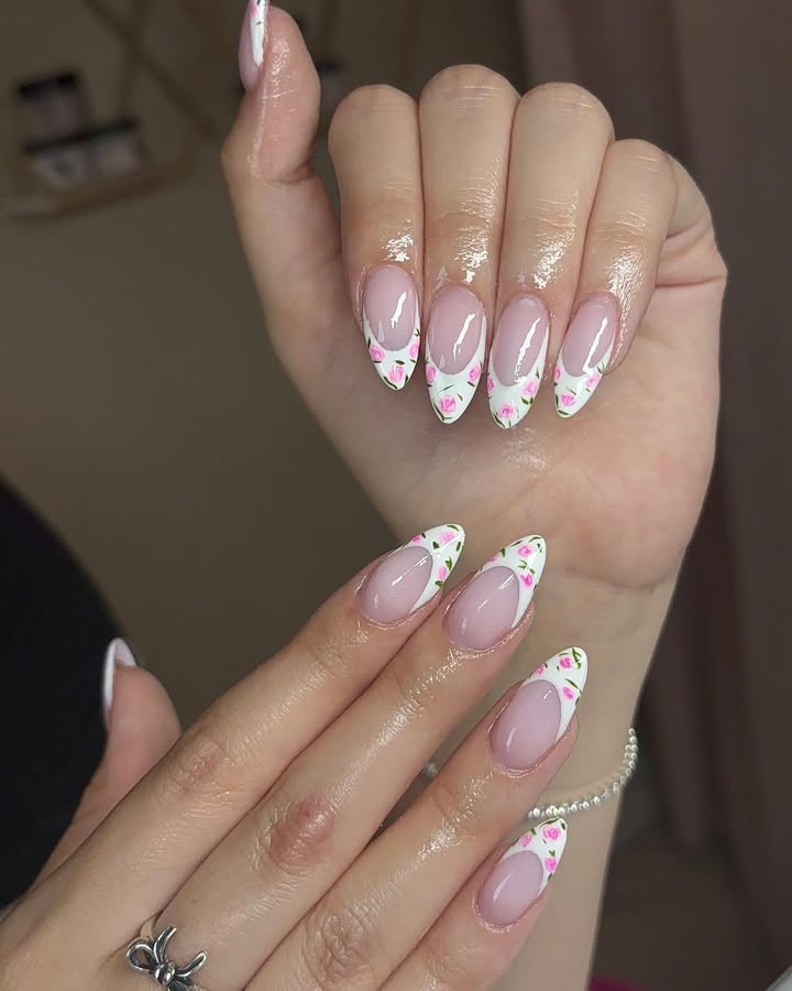French-tip-nails-with-white-tips-and-dainty-pink-rosebud-accents.__.jpg