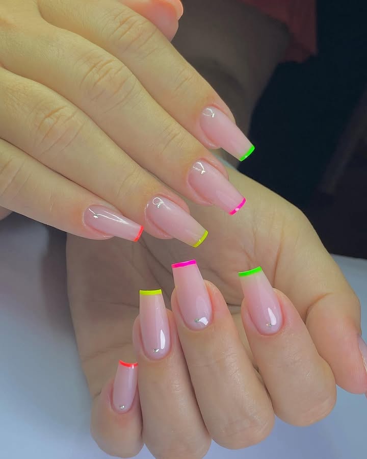 Neon-pastel-French-tip-nails-with-bold-electric-colors.__.jpg