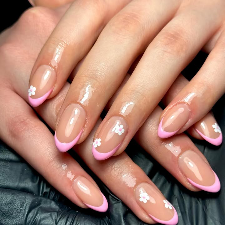 Pink-French-tip-nails-with-delicate-fairy-bloom-accents.jpg