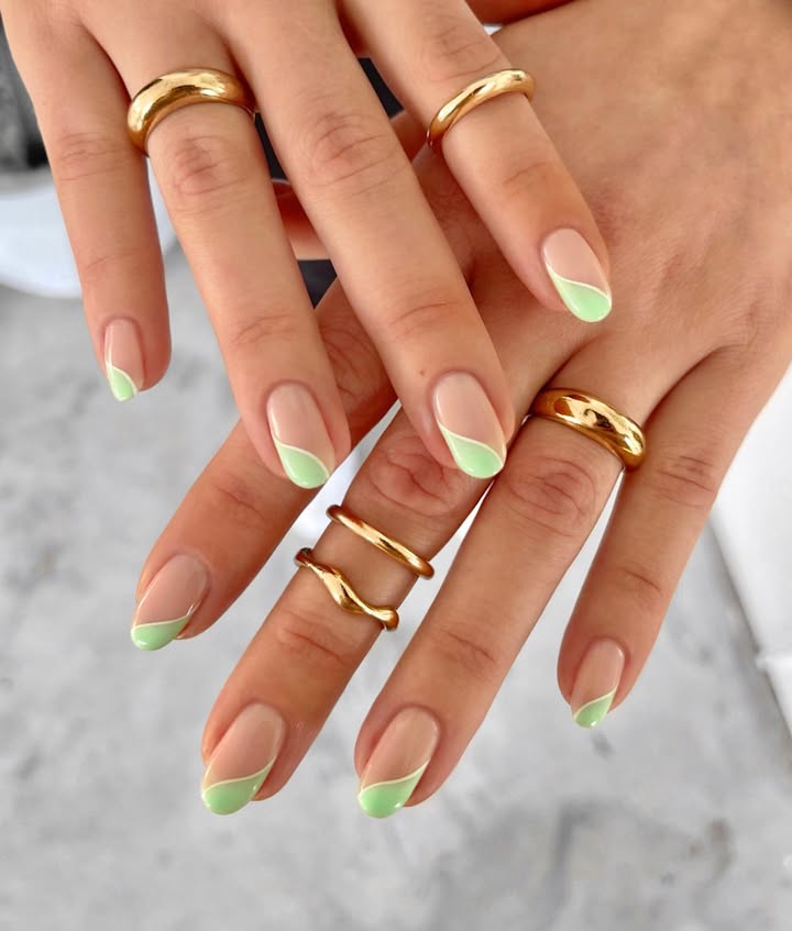 mint-French-tip-nails-with-diagonal-swoops.__-1.jpg