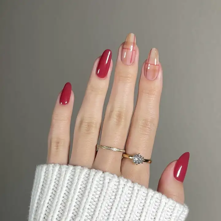 Crimson-and-brown-graphic-fall-nails-desing 2025-webp
