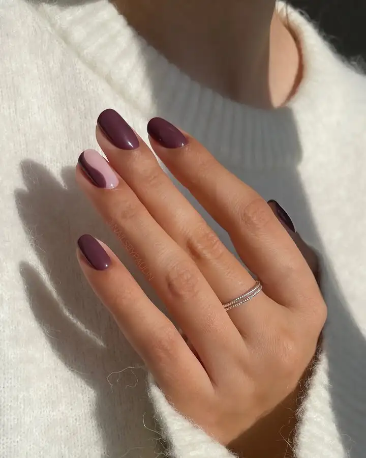 Moody-berry-nails-with-pink-touch.webp