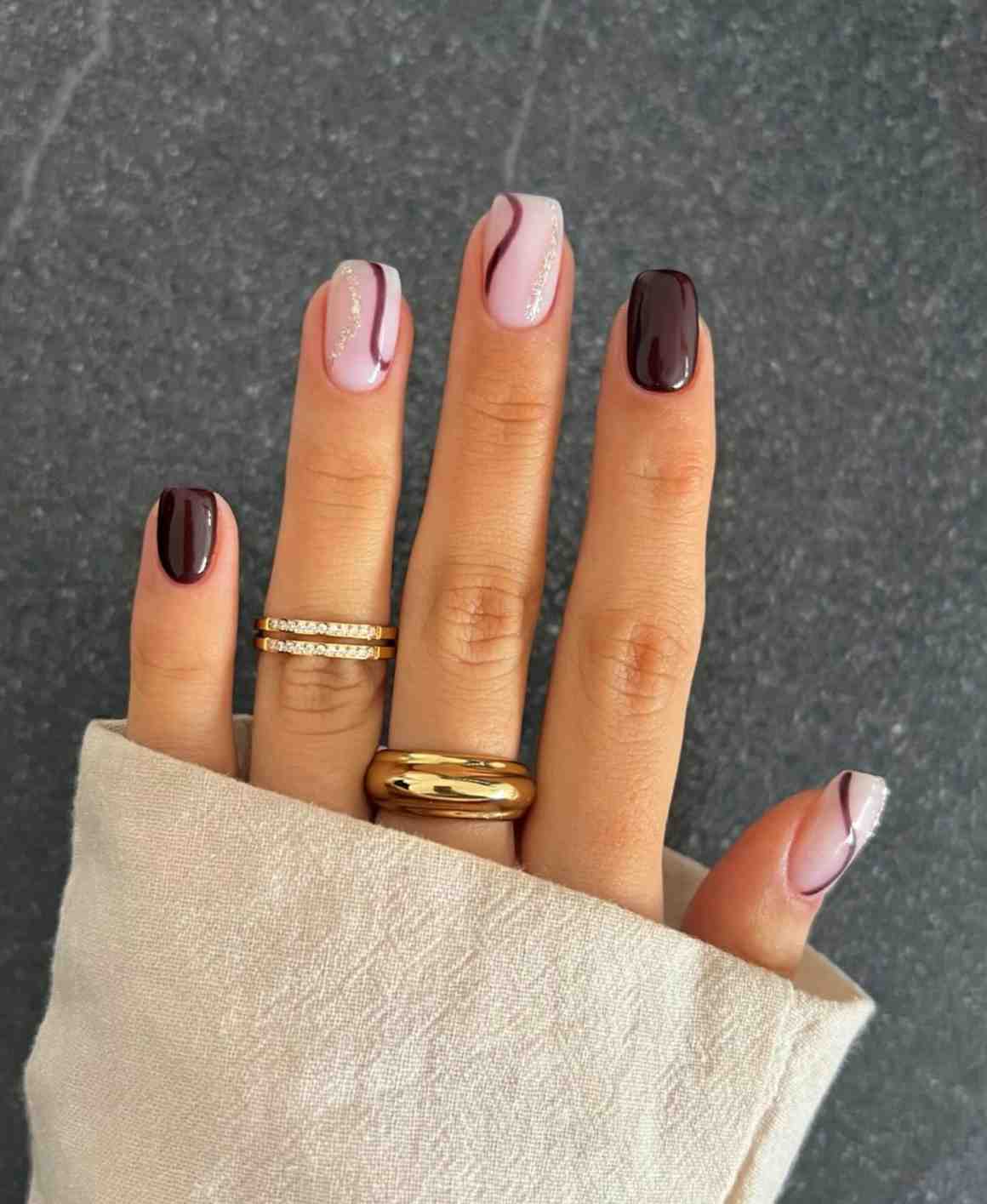 chocolate-swirl-brown nail-design-idea2025