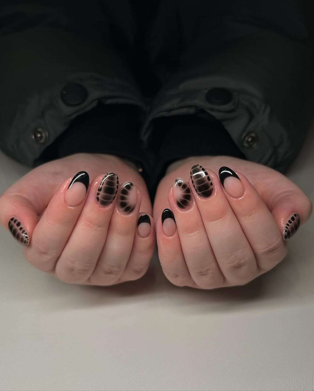 Black grid French tip nails.jpeg