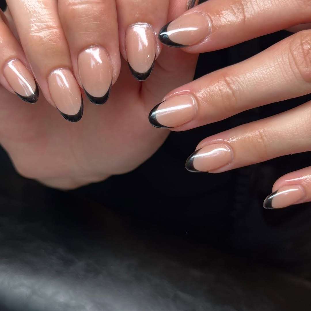 Glossy black wink French tips.jpeg