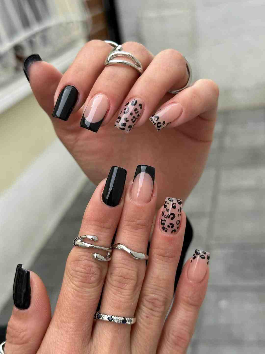 Leopard print black French tips.jpeg