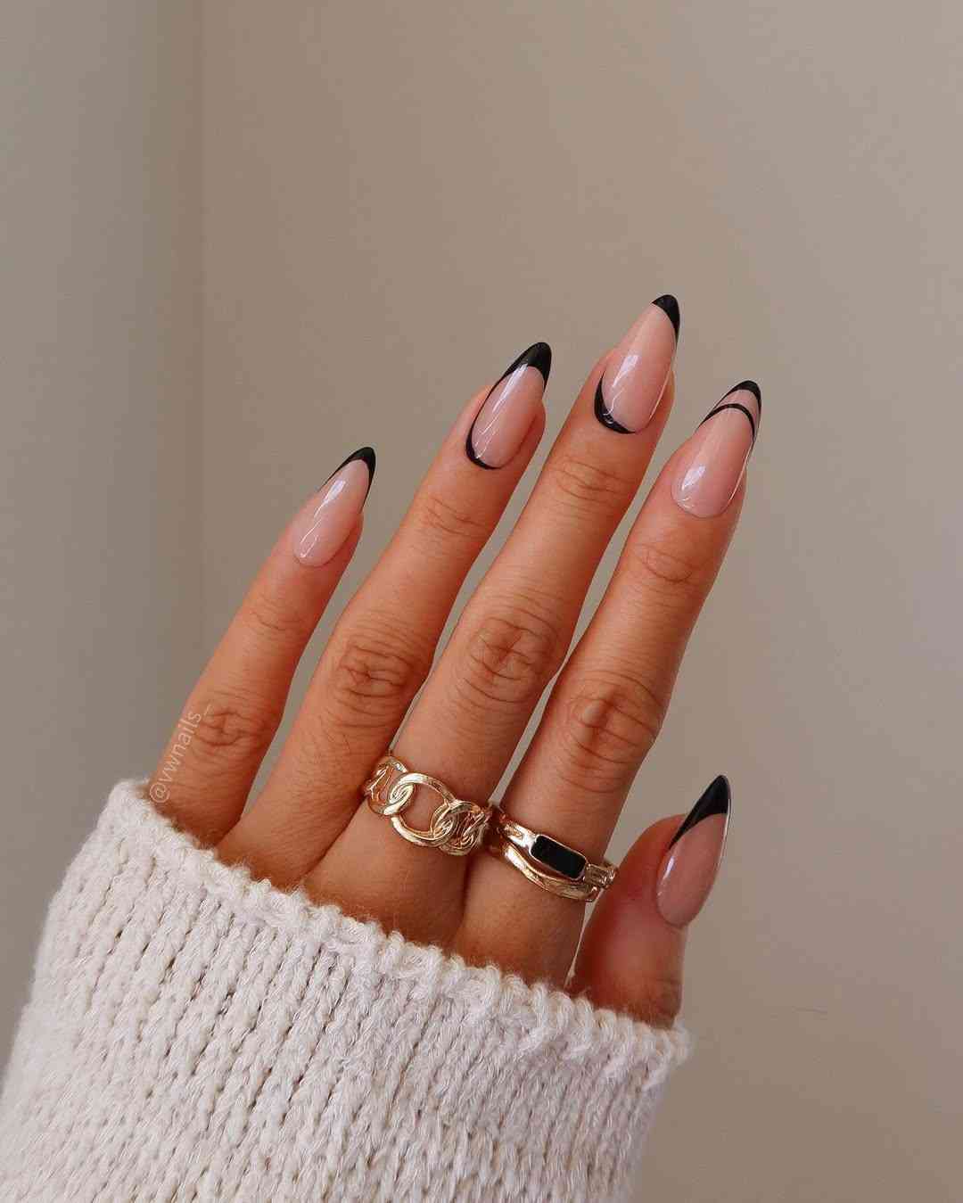 Nude base soft black tip nails design